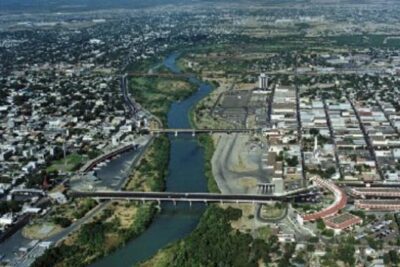 recoleccion basura nuevo laredo vista panoramica de ciudad dividad por un rio